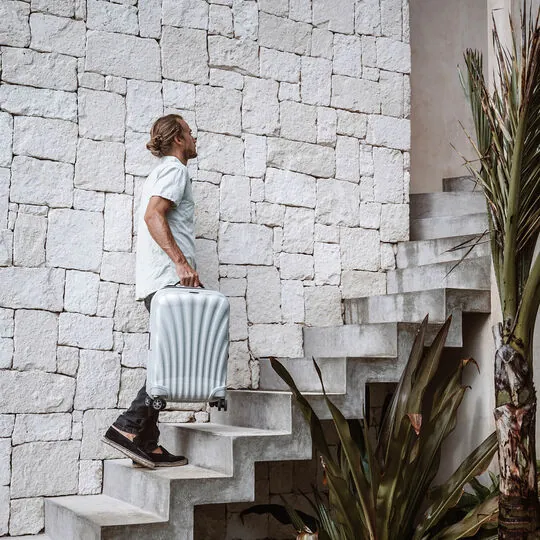 man travelling with best luggage for long weekends