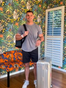 Jesse Kriel posing with Samsonite suitcase